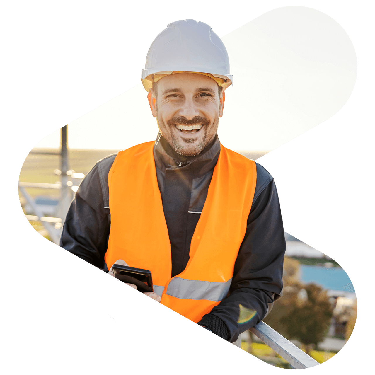 Business man smiling while looking at a computer